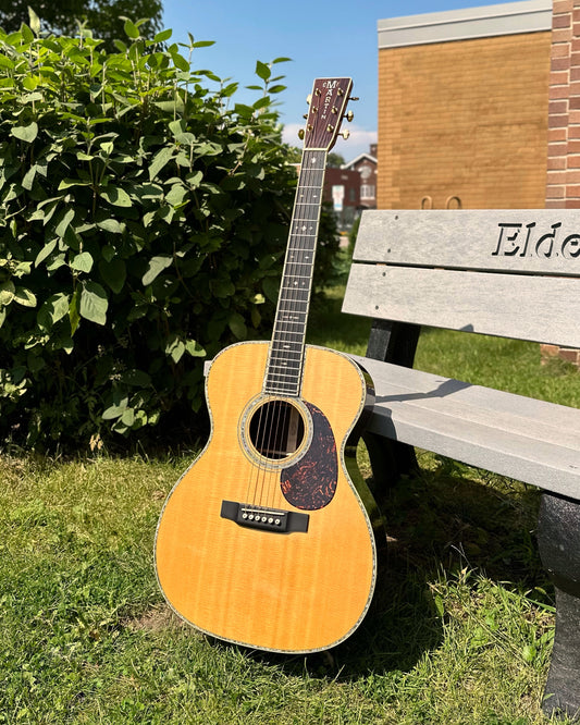 Showroom photo of full front of Martin 000-42 Acoustic Guitar (2004)