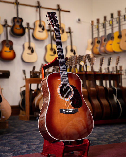 Showroom photo of Full front and side of Martin HD-28V Ambertone Acoustic Guitar 