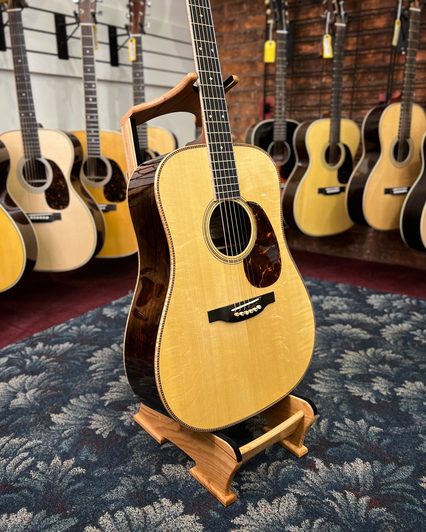 Showroom photo of Front and side of Bourgeois Custom D Brazilian Acoustic Guitar (2009)