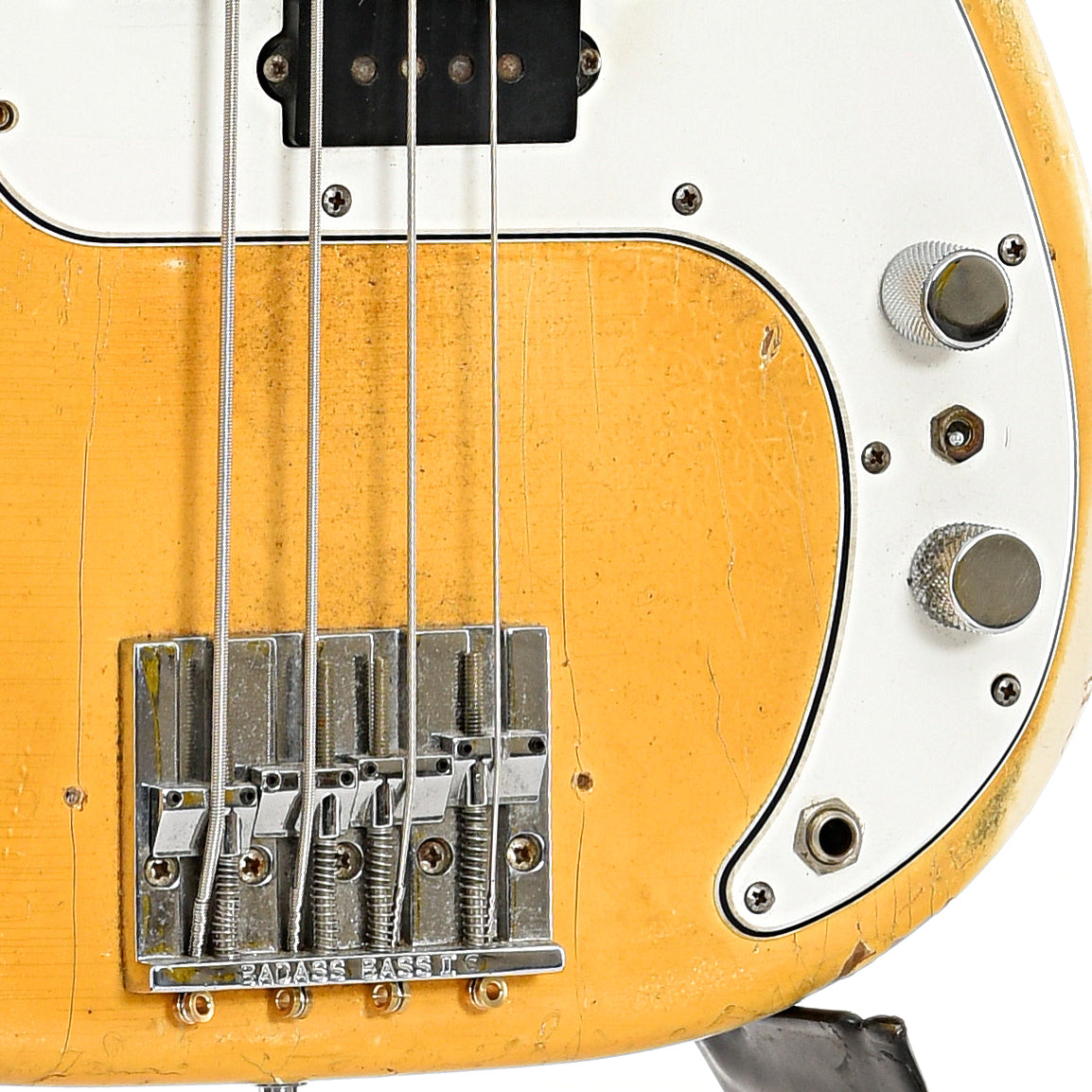 Bridge and controls of Fender Precision Electric Bass 