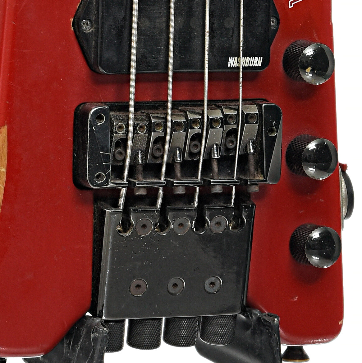 Bridge  and controls of Washburn Bantam Headless 4-String Electric Bass