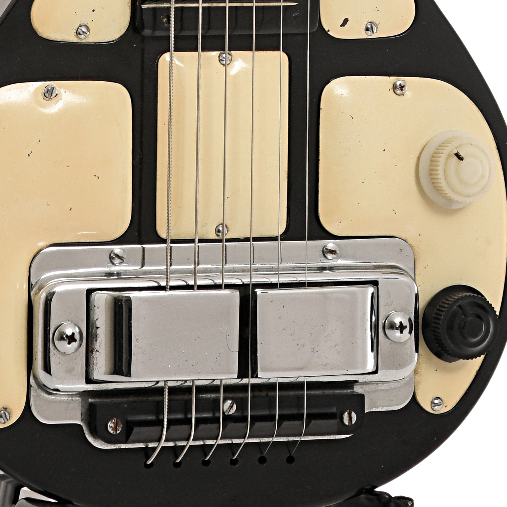 Bridge, Volume knob and pickup cover of Rickenbacker Model B