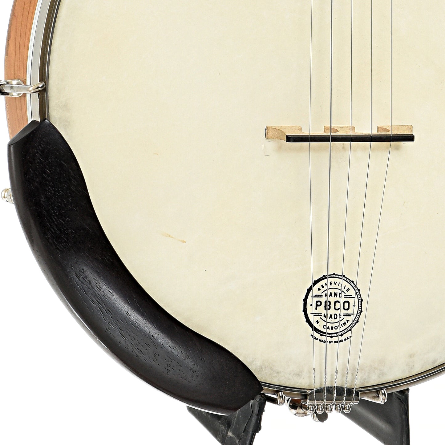 Armrest, tailpiece and bridge of Pisgah Possum Cherry 12" Open Back Banjo (c.2014)