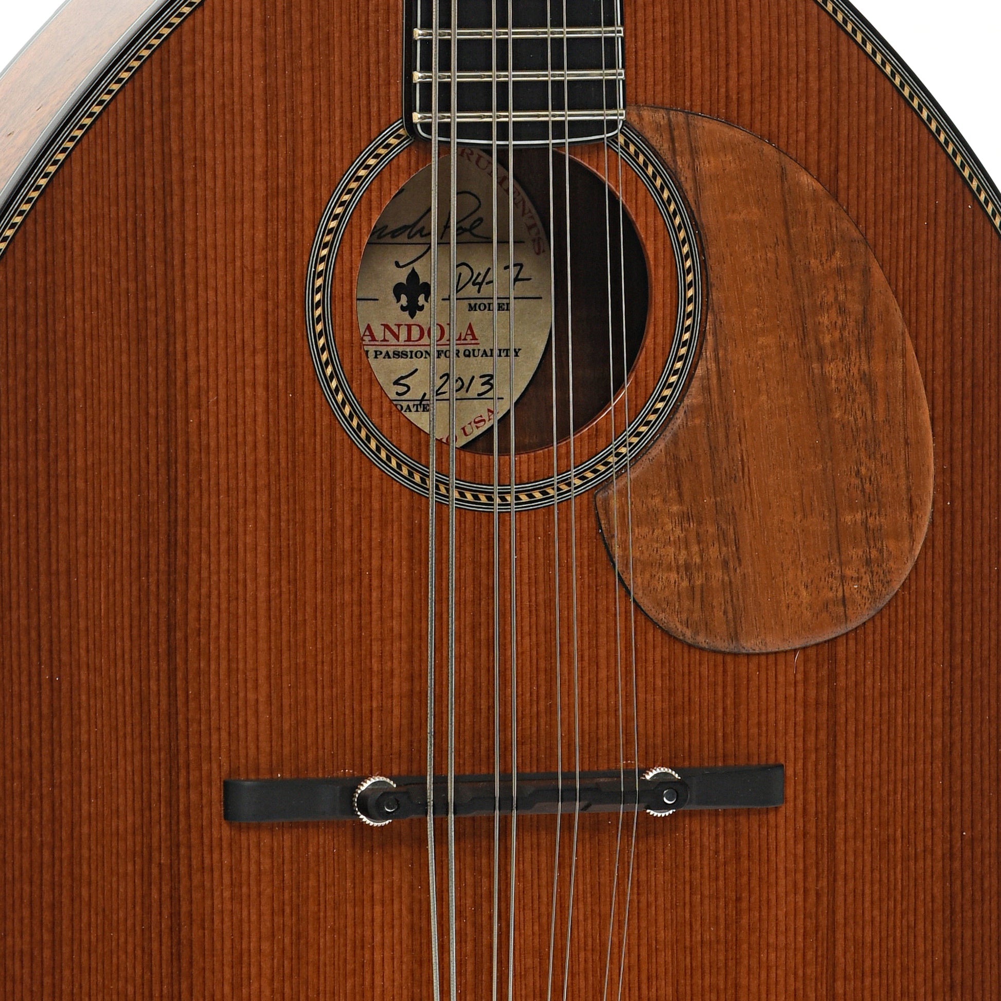 Bridge and sound hole of Poe Scout D4-7 Mandola