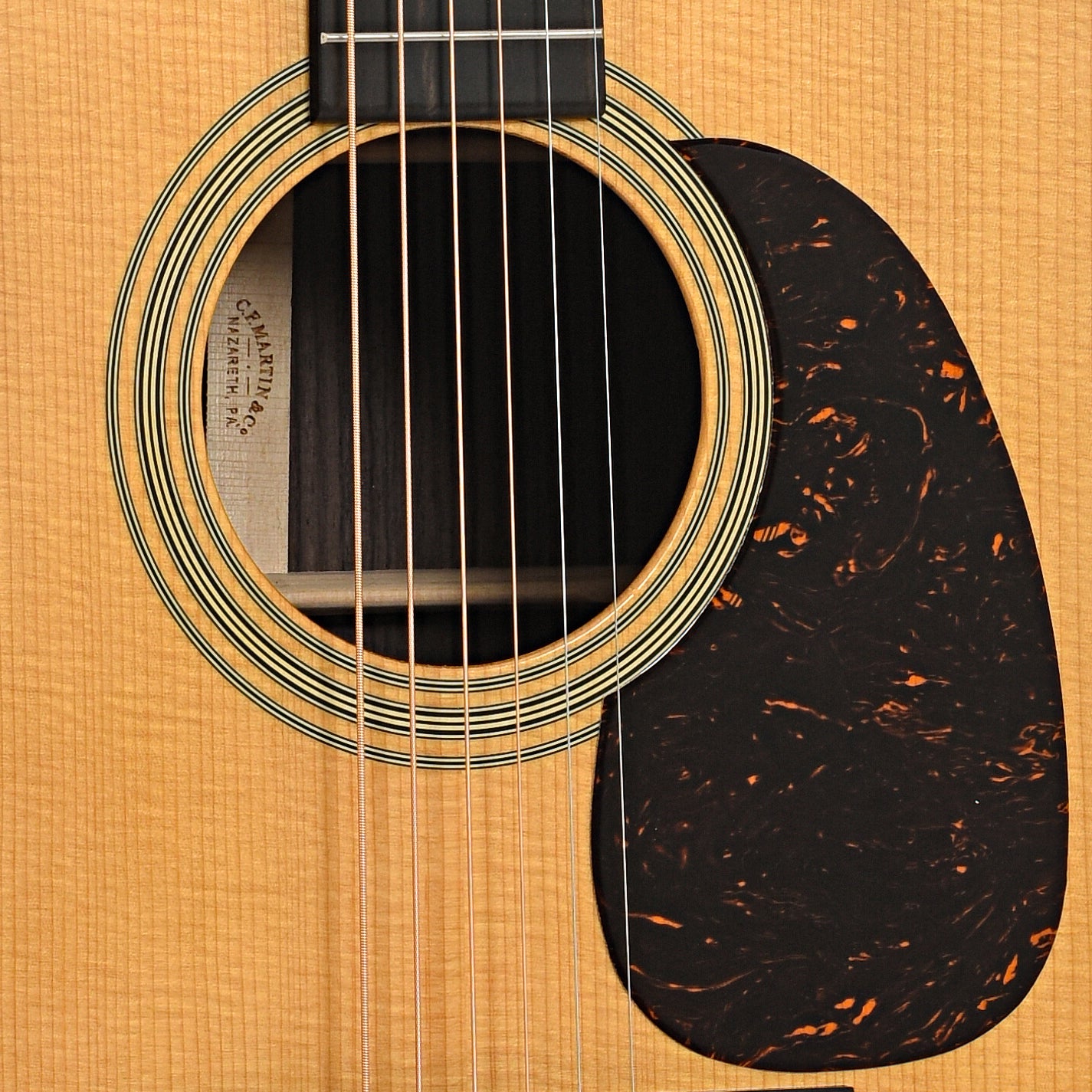 Sound hole and pickguard of Martin D-28 Satin Acoustic