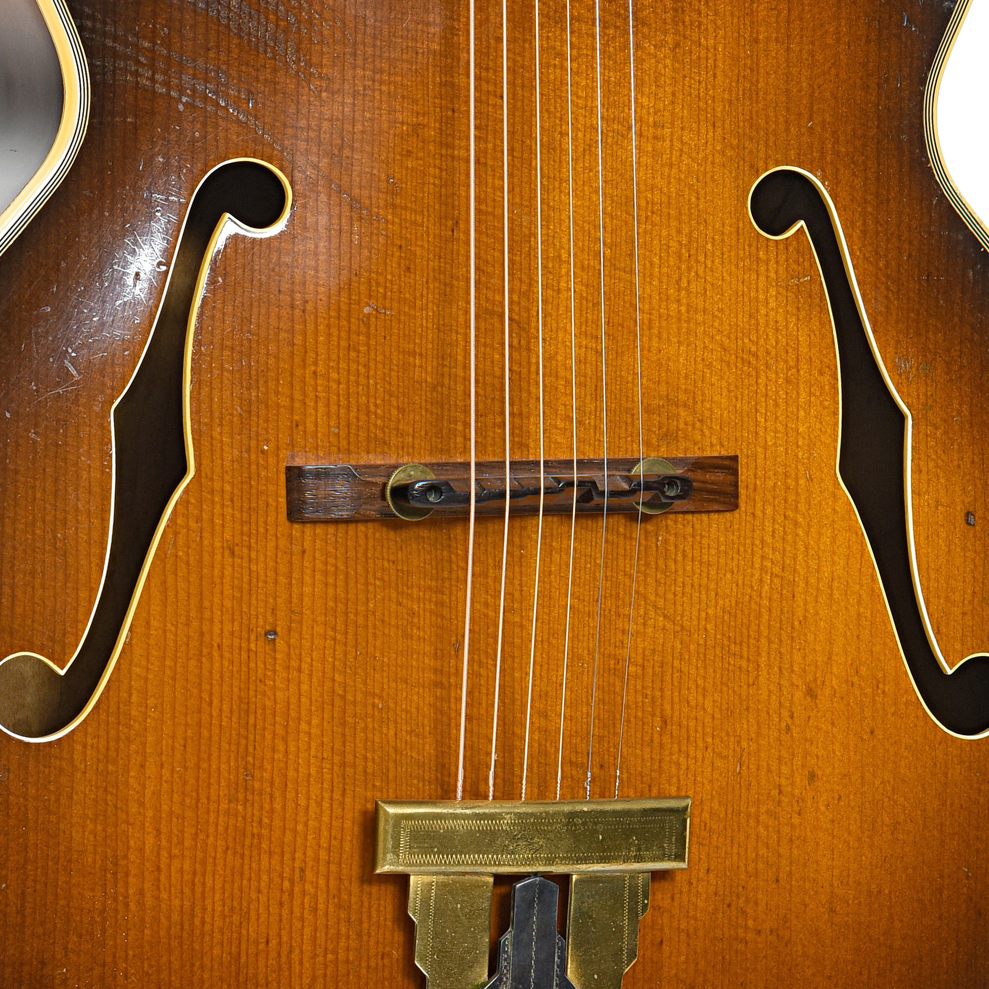 Bridge and f-holes of Gibson L-5C Archtop Acoustic Guitar