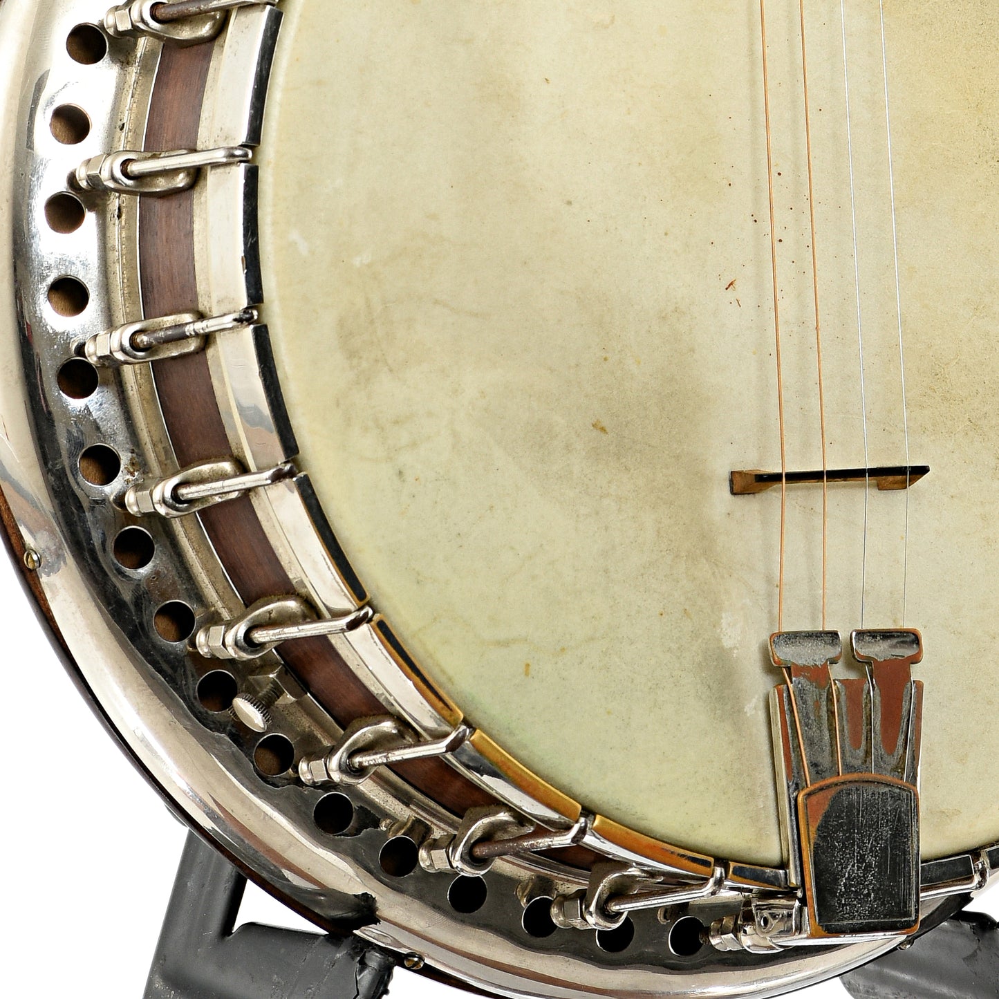 Lower left side rim of Bacon & Day Silver Bell No.1 Tenor Banjo