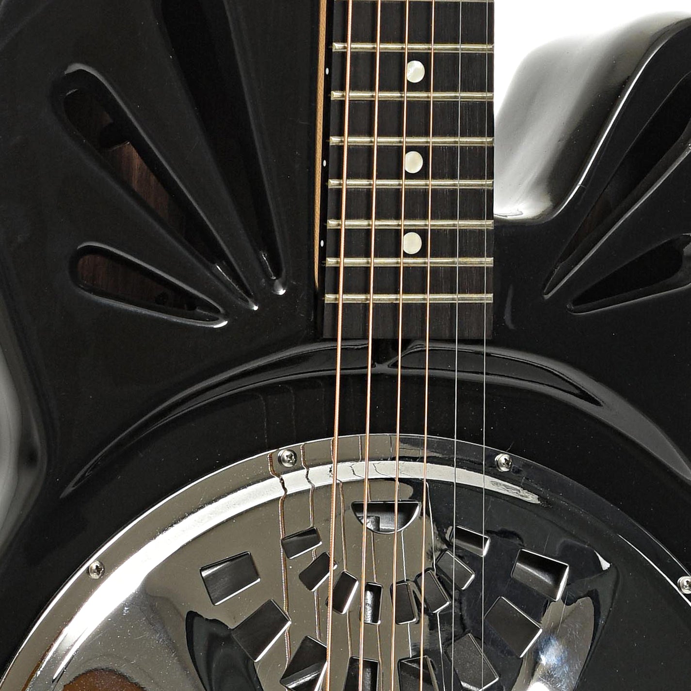 Sound holes of Mel-O-Bro Resonator Guitar (2002)