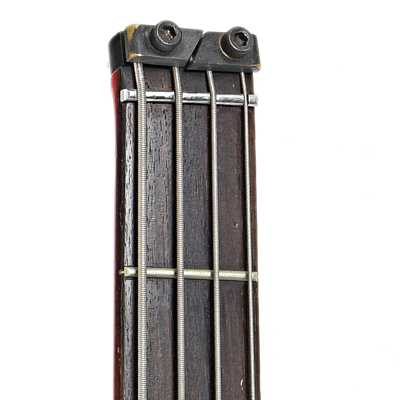 Front headstock of Washburn Bantam Headless 4-String Electric Bass