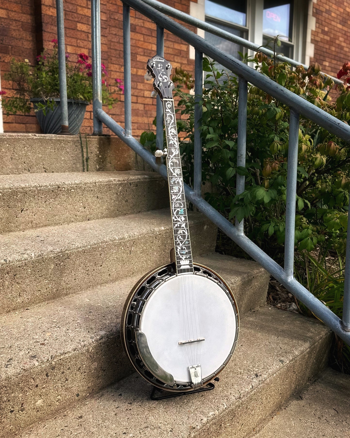 Showroom photo of Full front and side of Wildwood Sololist Custom Resonator Banjo (c.2008)