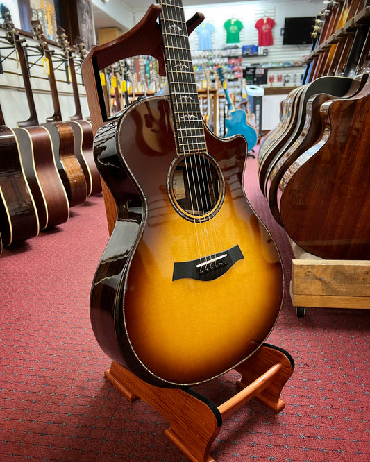 Showroom photo of Taylor 912ce Sunburst Guitar & Case