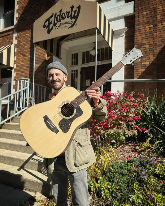 Showroom photo of Front of Guild 300 Series D-340 Acoustic Guitar