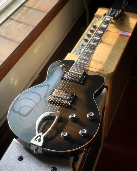 Showroom photo of Guild Aristocrat HH Guitar - Trans Black Burst