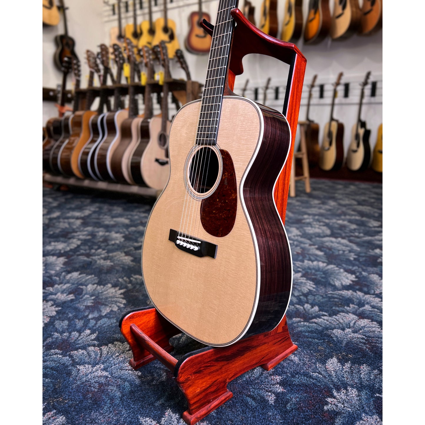 Showroom photo of Bourgeois Professional Series Vintage OO Acoustic Guitar & Case