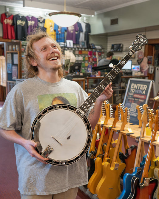 Showroom photo of full front of Gibson Earl Scruggs Standard Resonator Banjo (2005)