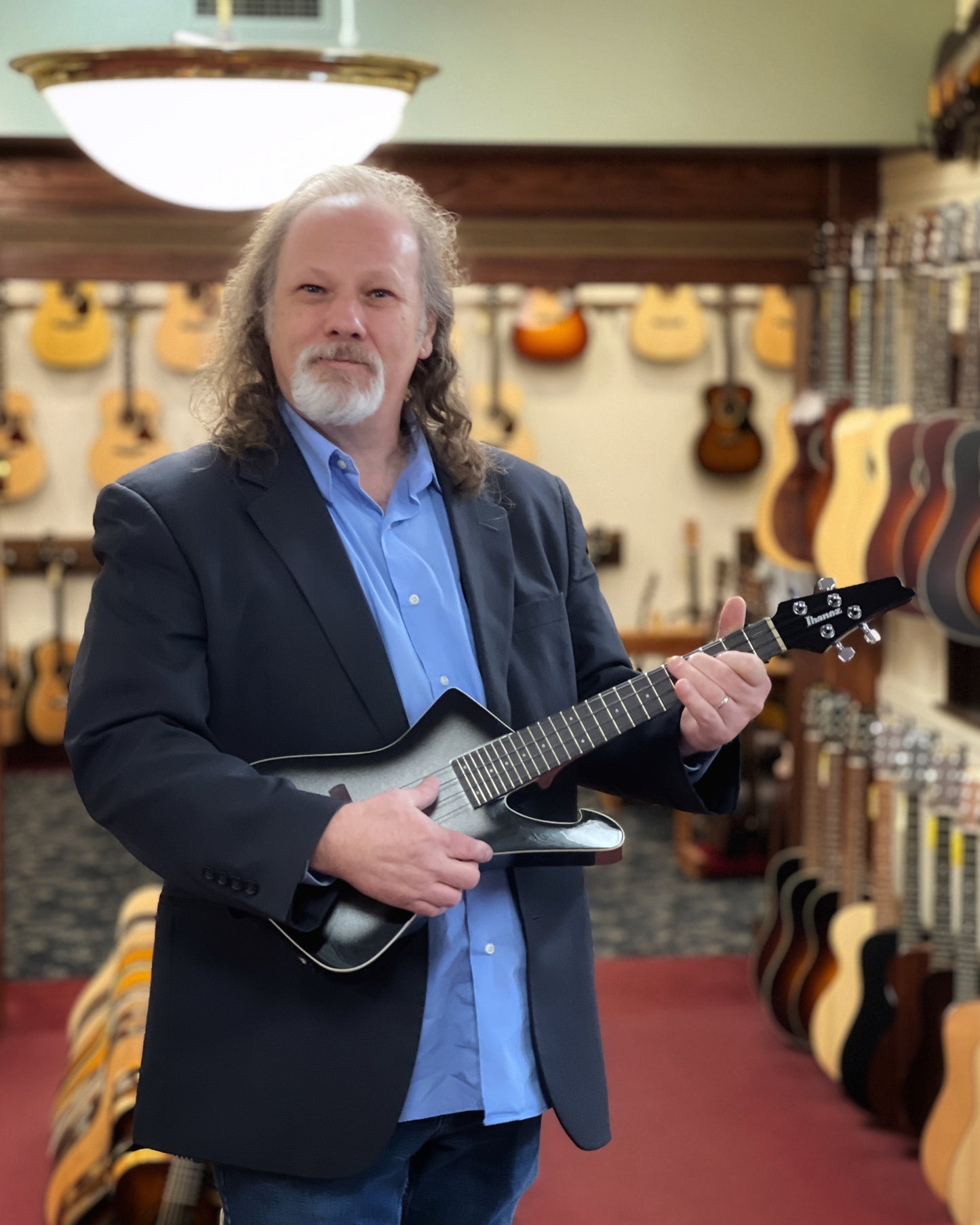 Showroom photo of Ibanez UICT100 Electric-Acoustic Tenor Ukulele, Metallic Gray Sunburst