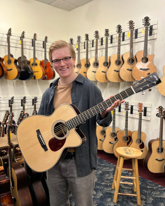 Showroom Photo of Front of Collings OM2H Cutaway Acoustic Guitar