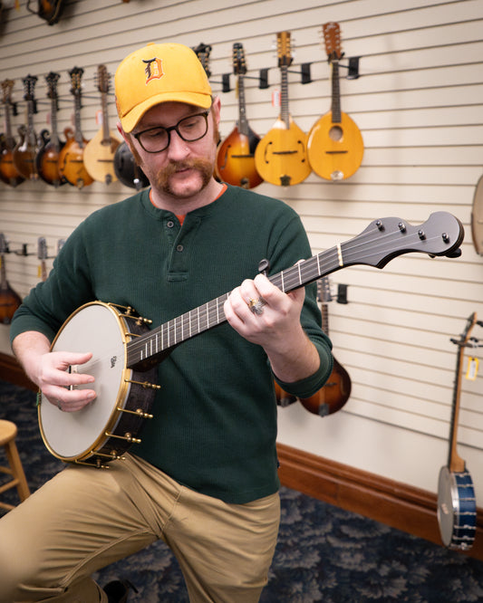 Showroom photo of Chuck Lee Lone Star Custom 12" Openback Banjo #865, Integral Wood Tone Ring