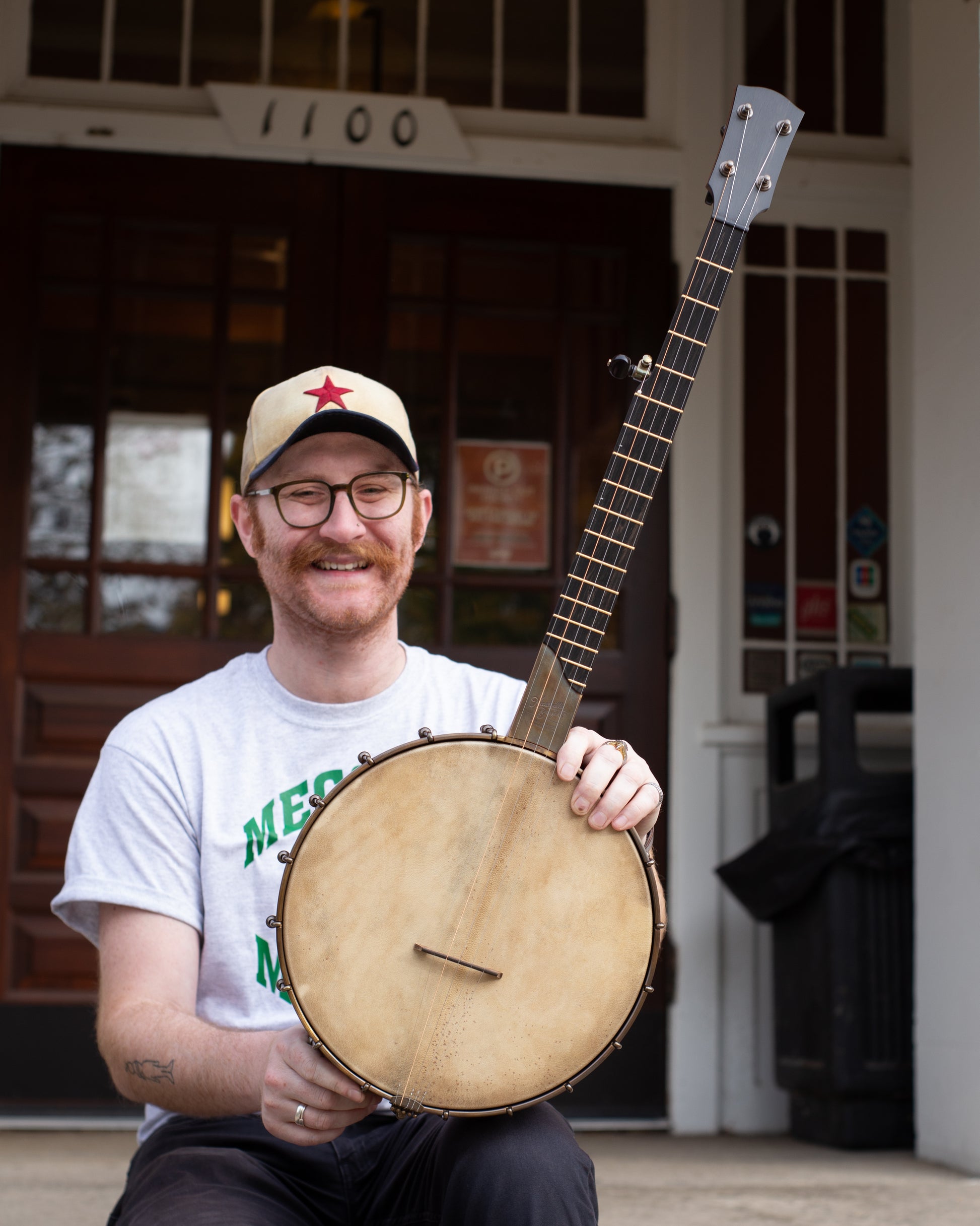 Showroom photo of Nashville Banjo Co Cumberland 12" Openback Banjo #141 & Gigbag, Walnut