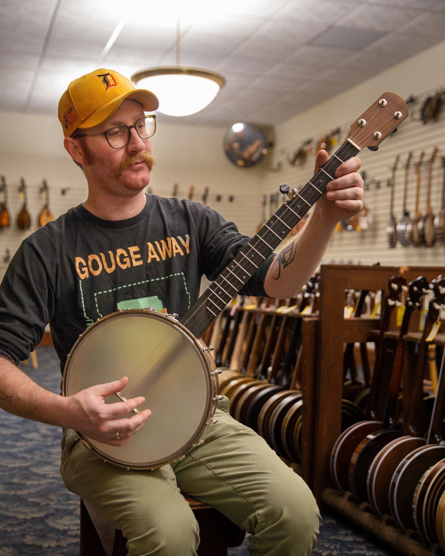 Showroom photo of Full Front and Side of Kevin Enoch 12" Tradesman Banjo