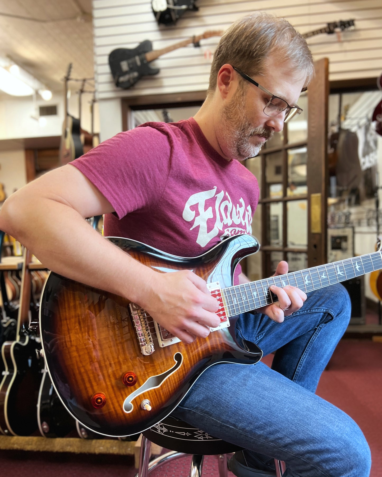 Showroom photo of PRS SE Hollowbody II Black Gold Burst