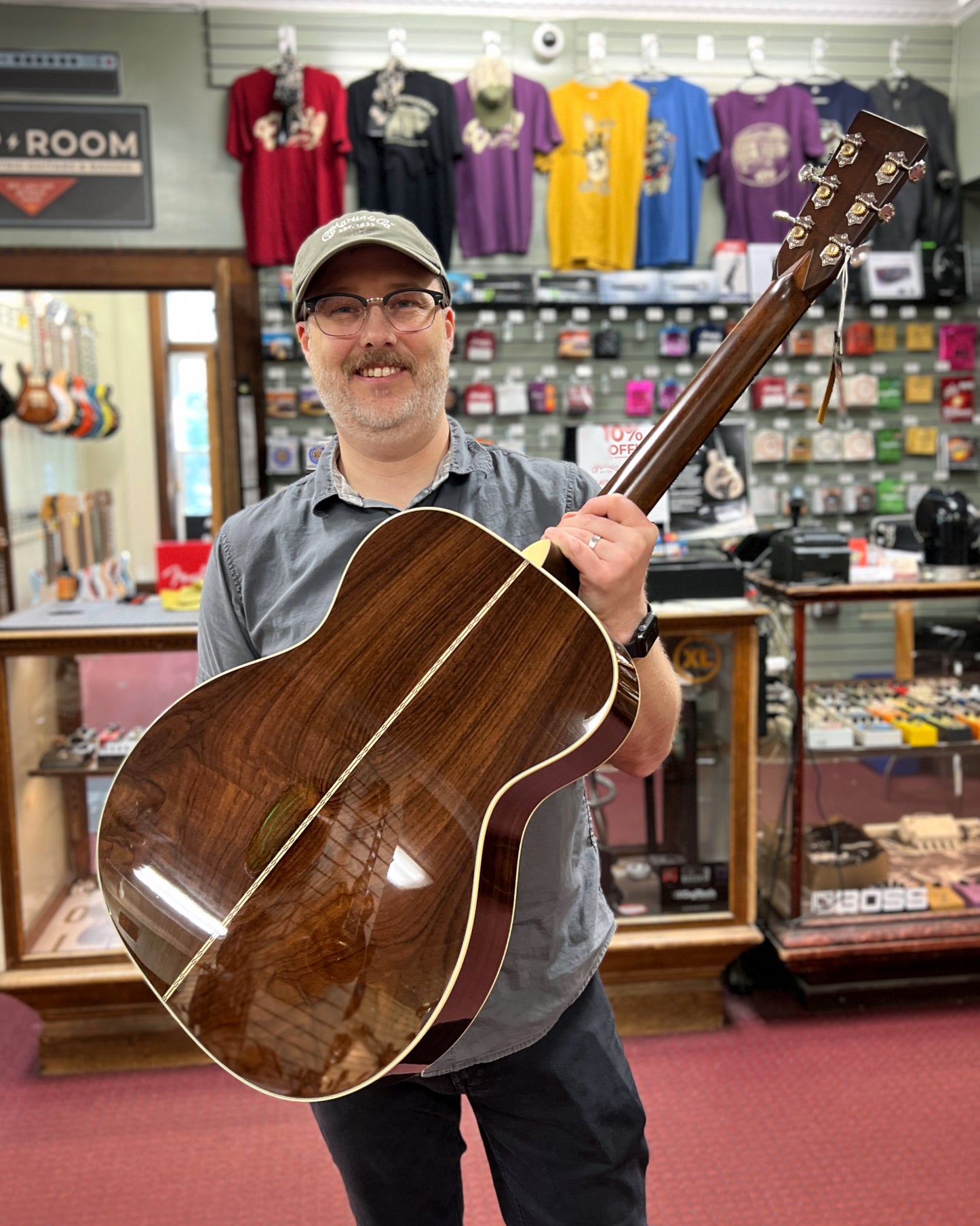 Showroom photo of Back of Martin Custom 28-Style 000 Guitar & Case, Wild Grain Rosewood & Adirondack Spruce