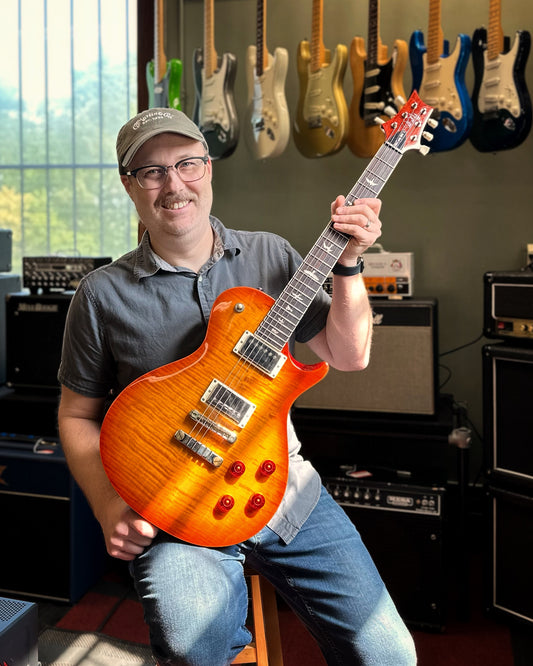 Showroom photo of full Front of PRS SE McCarty 594 Singlecut, Vintage Sunburst