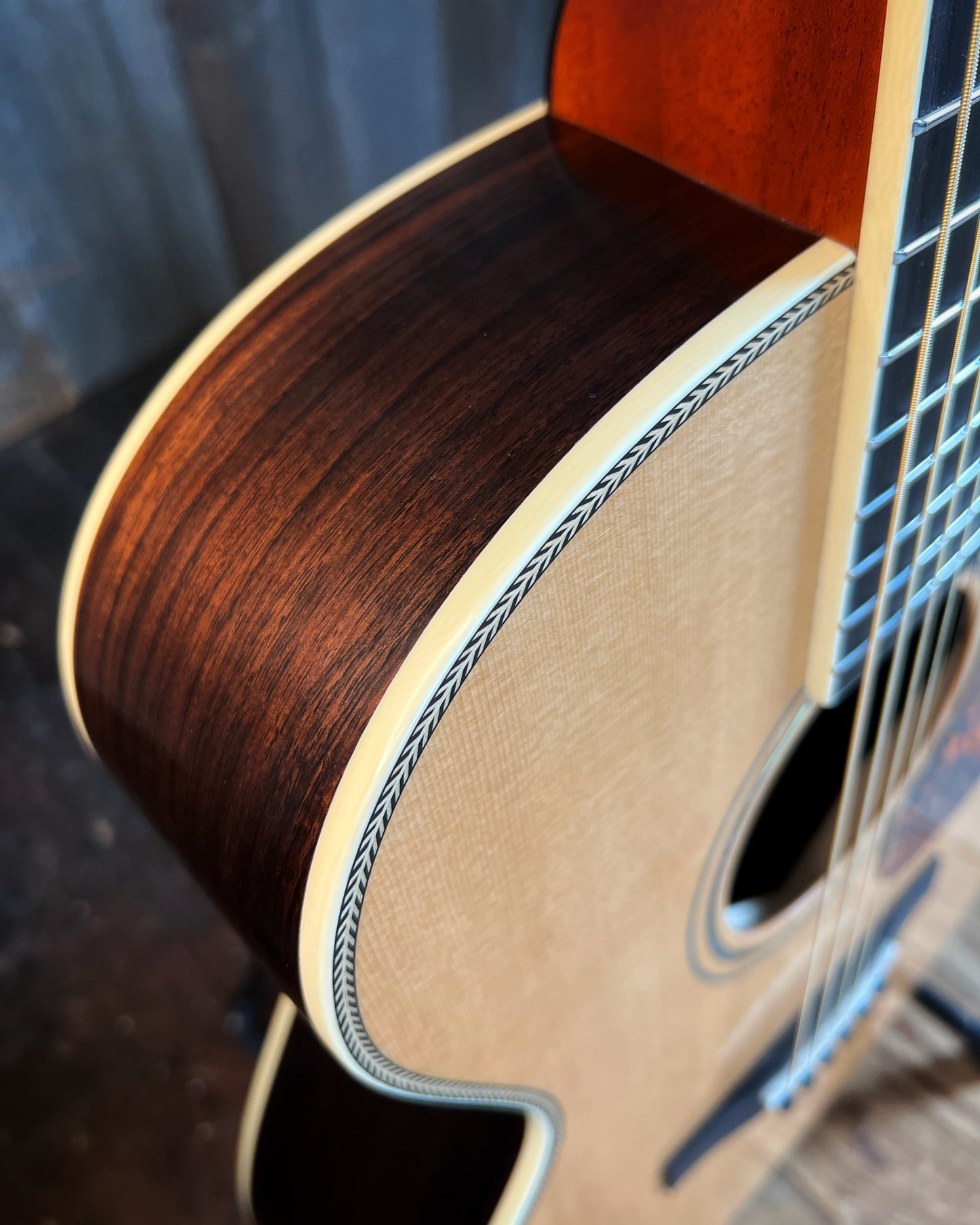 Showroom photo of Furch Vintage 2 OM-SR Acoustic Guitar