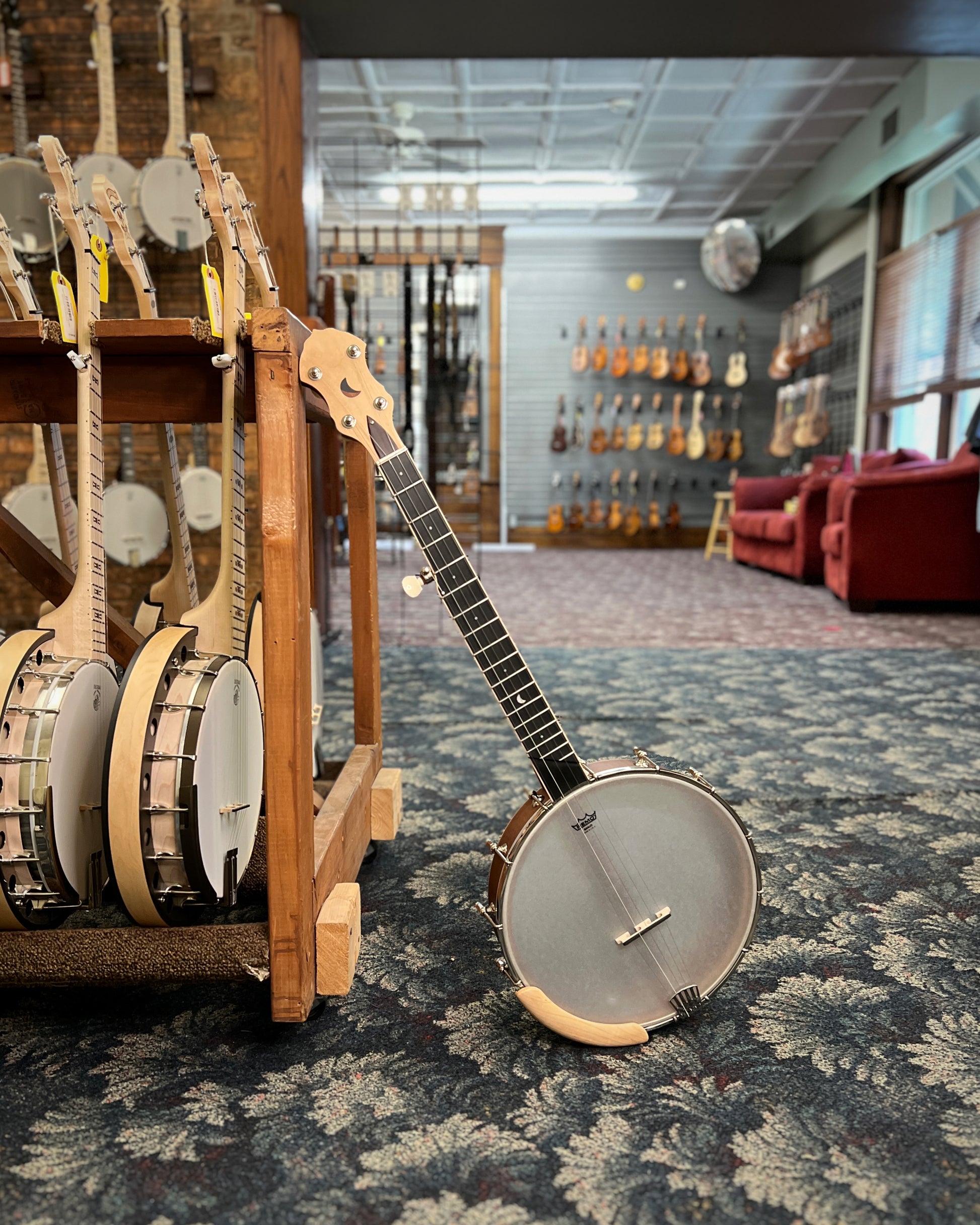 Showroom photo of Gold Tone HM-100 High Moon A-Scale Openback Banjo & Case