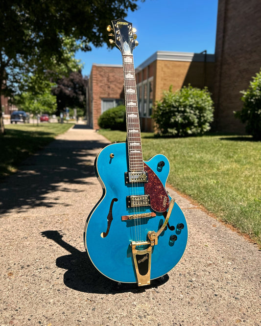 Outdoor photo of Front of Gretsch G2410TG Streamliner Hollow Body Single Cut with Bigsby, Ocean Turquoise