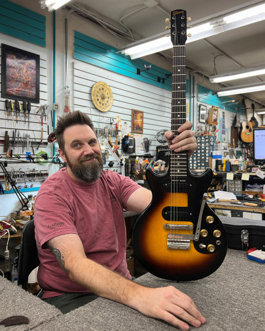 Showroom photo of Front of Gibson Melody Maker D Electric Guitar (1962)