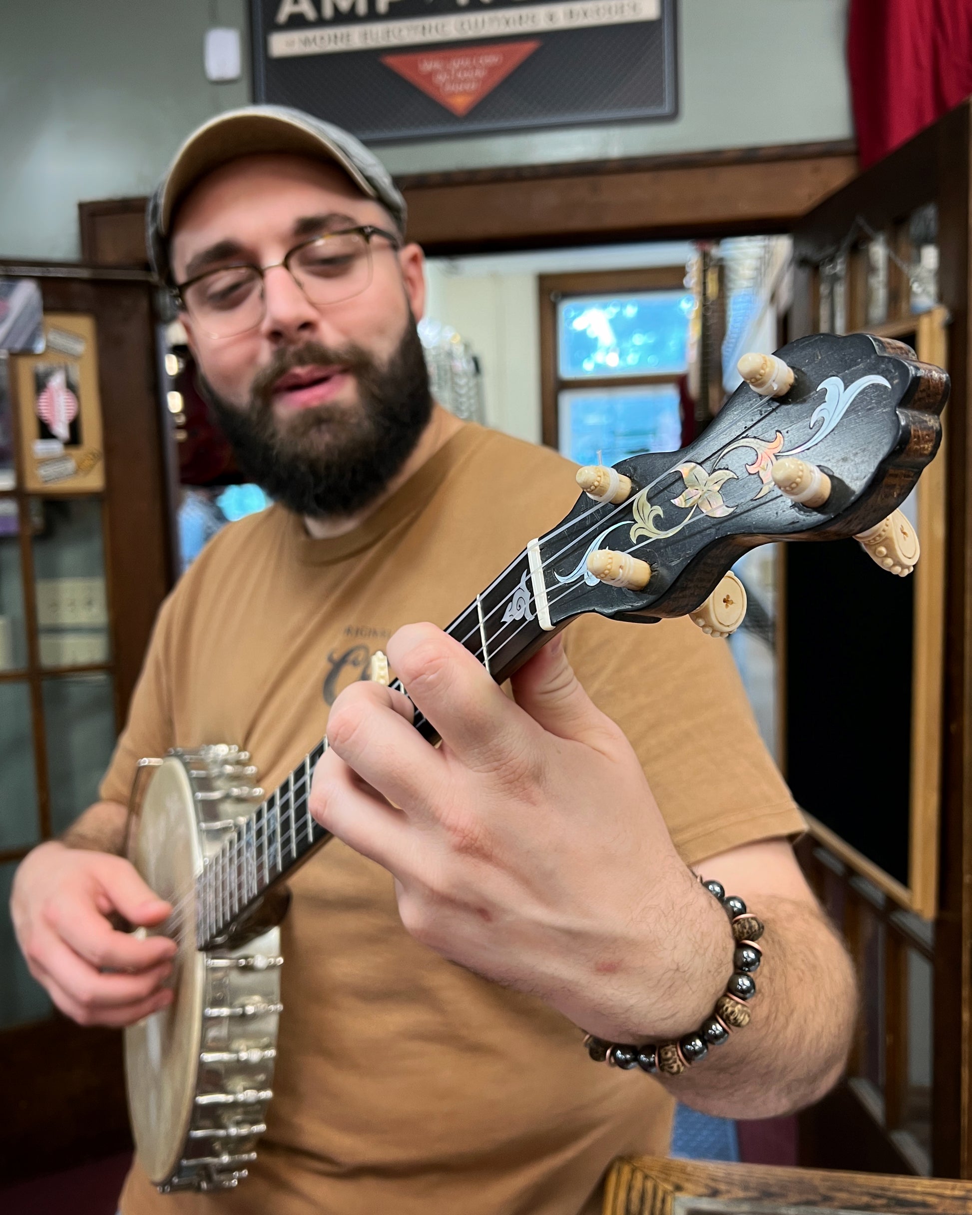 Showroom photo of Front of Fairbanks Electric No.0 Open Back Banjo 