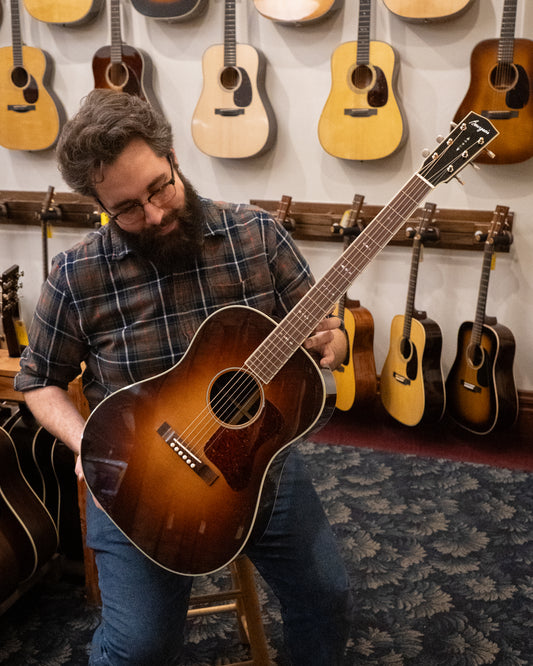 Showroom photo of Front of Bourgeois Aged Tone Series Advanced Slope Shoulder Dreadnought Guitar