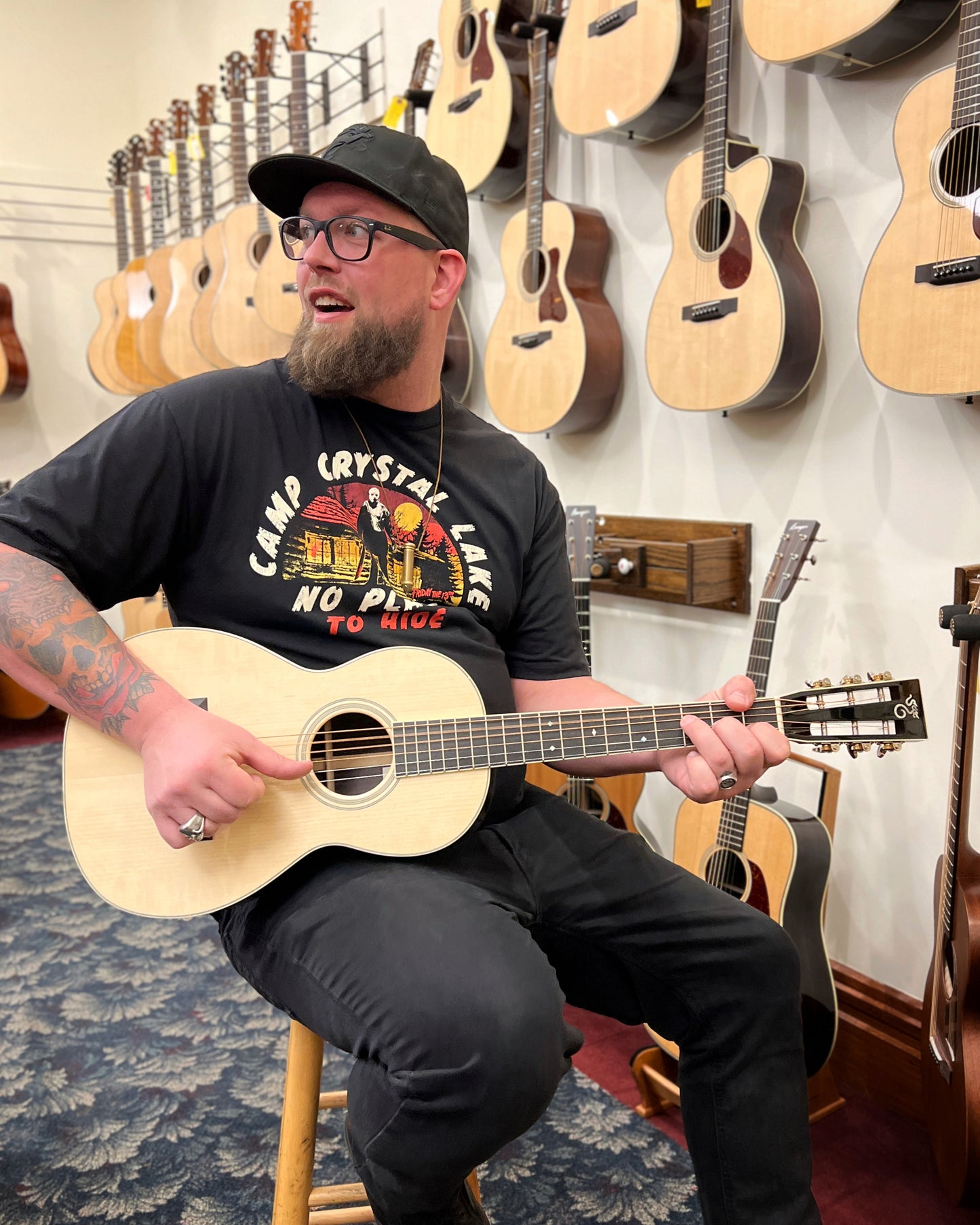 Showroom photo of Santa Cruz Custom PJ Acoustic Guitar and Case