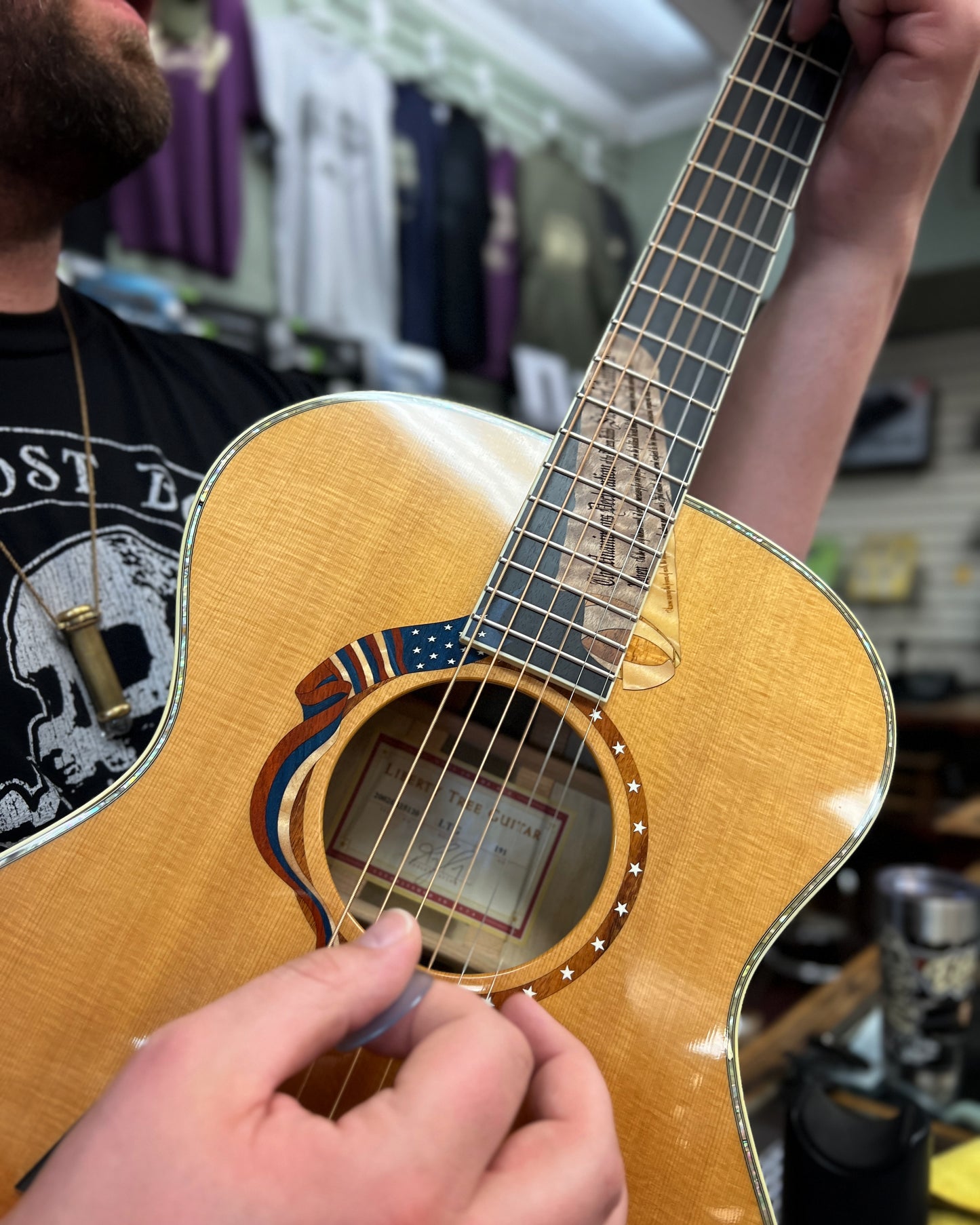 Showroom photo of Sound hole of Taylor LTG Liberty Tree Acoustic Guitar (2002)