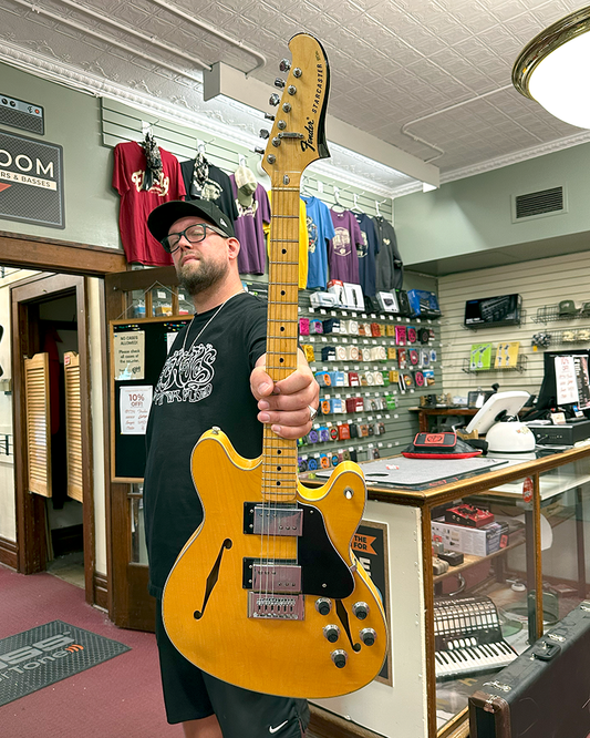 Showroom photo of Fender Starcaster Semi-Hollowbody Electric Guitar (1975)