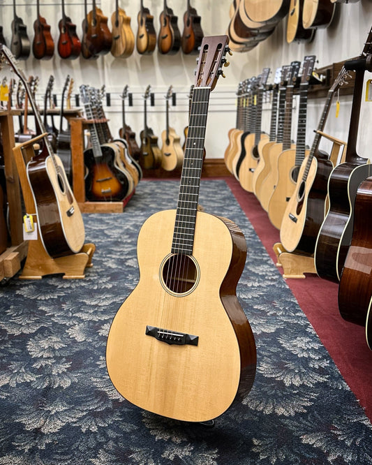 Showroom photo of front and side of Martin K-1 Major Kealakai Guitar & Case