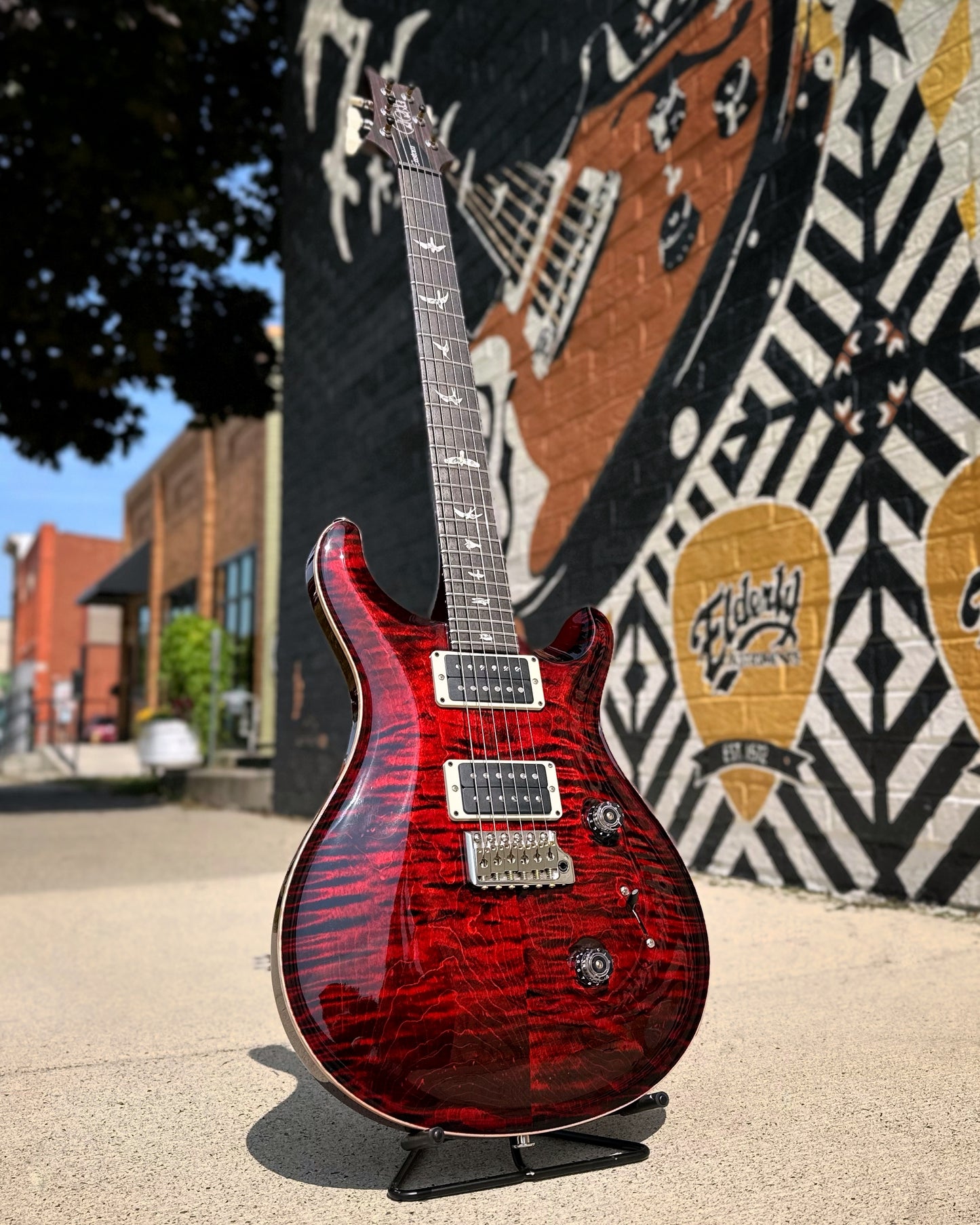 Showroom photo of Front of PRS Custom 24 Fire Red Burst Electric Guitar