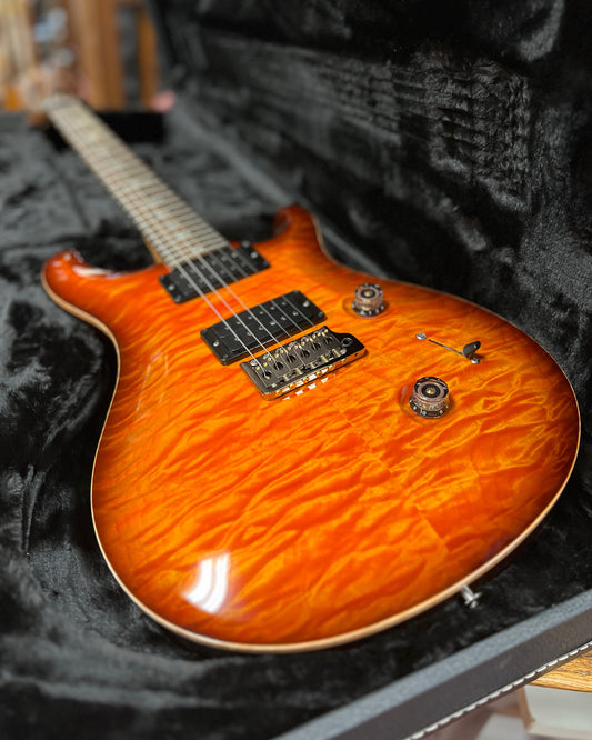 Showroom photo of Front of PRS Custom 24 Quilted Maple 10-Top Fatback Electric Guitar, Tobacco Burst