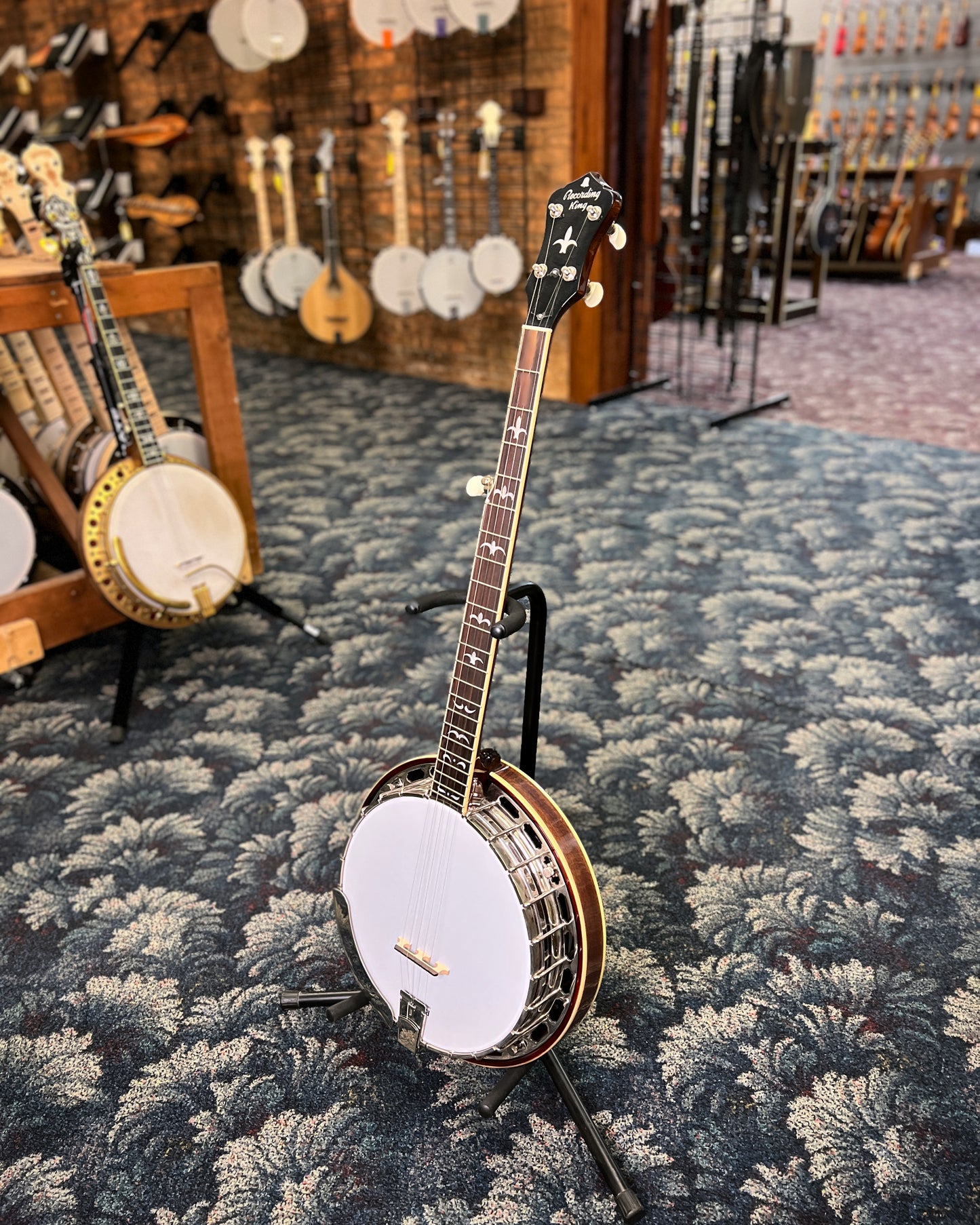 Showroom photo of Front and Side of Recording King Madison Deluxe Resonator Banjo