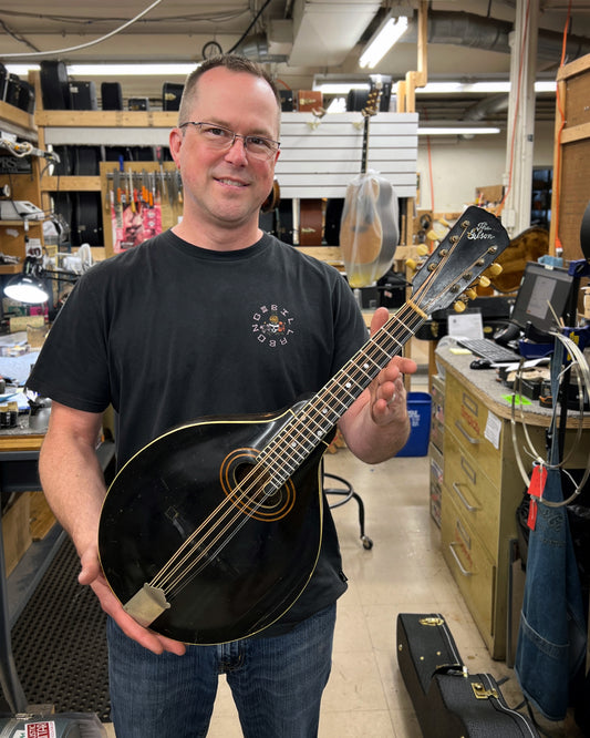 Showroom Photo of Front of Gibson H-1 Mandola (1921)