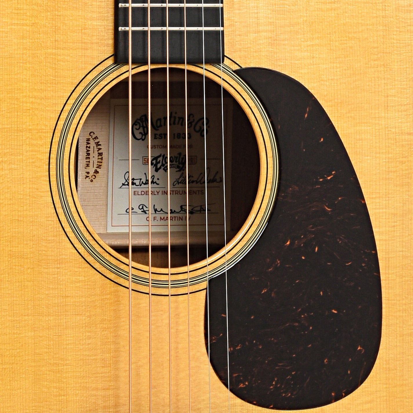 Sound hole and pickguard of Martin Custom 18-Style Dreadnought