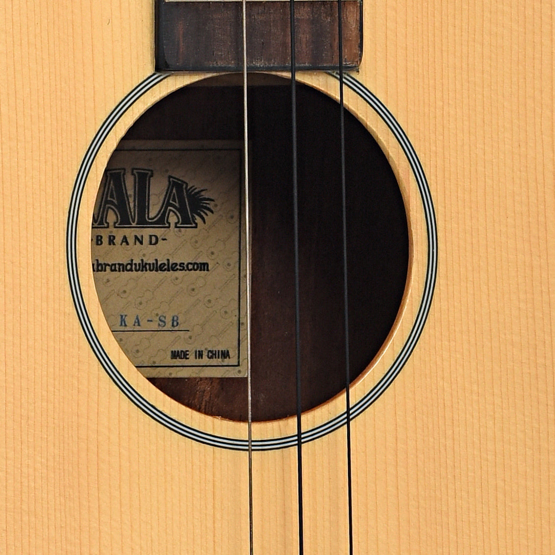 Sound hole of Kala KA-SB Baritone Ukulele